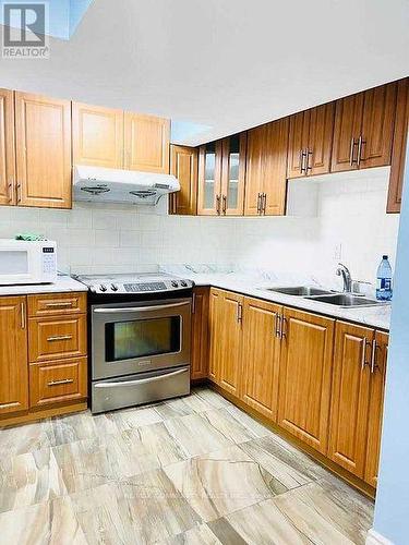 47 Pregasus Trail, Toronto, ON - Indoor Photo Showing Kitchen With Double Sink