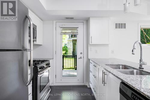 101 - 8 Brandy Lane Drive, Collingwood, ON - Indoor Photo Showing Kitchen With Double Sink