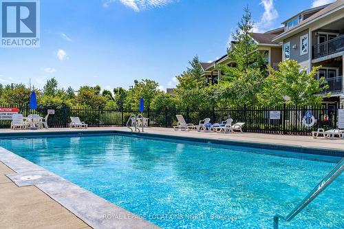 101 - 8 Brandy Lane Drive, Collingwood, ON - Outdoor With In Ground Pool