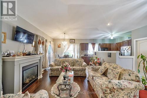 599 Fox Hollow Court, Woodstock, ON - Indoor Photo Showing Living Room With Fireplace