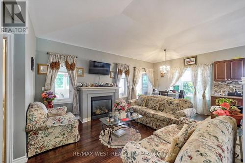 599 Fox Hollow Court, Woodstock, ON - Indoor Photo Showing Living Room With Fireplace