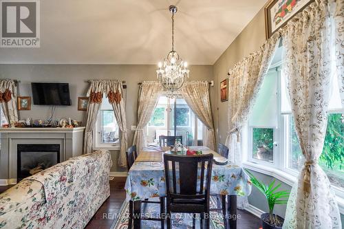 599 Fox Hollow Court, Woodstock, ON - Indoor Photo Showing Dining Room With Fireplace