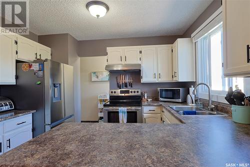 1526 Helme Crescent, Prince Albert, SK - Indoor Photo Showing Kitchen With Double Sink