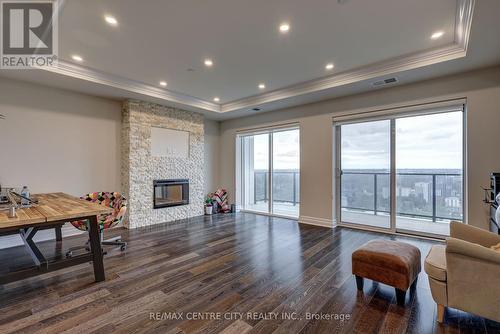 2402 - 505 Talbot Street, London, ON - Indoor Photo Showing Living Room With Fireplace