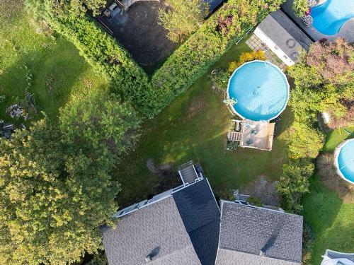 Backyard - 45 Rue Du Parc-Woodland, Léry, QC - Outdoor With Above Ground Pool