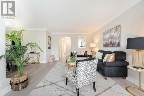 319 - 551 The West Mall, Toronto, ON - Indoor Photo Showing Living Room With Fireplace