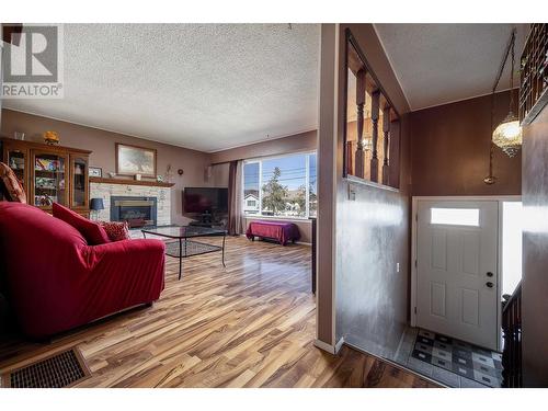 1208 38 Avenue, Vernon, BC - Indoor Photo Showing Living Room With Fireplace