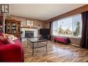 1208 38 Avenue, Vernon, BC  - Indoor Photo Showing Living Room With Fireplace 