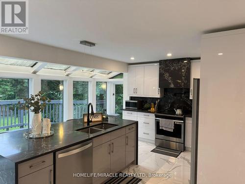 1491 Finch Avenue, Pickering, ON - Indoor Photo Showing Kitchen With Double Sink