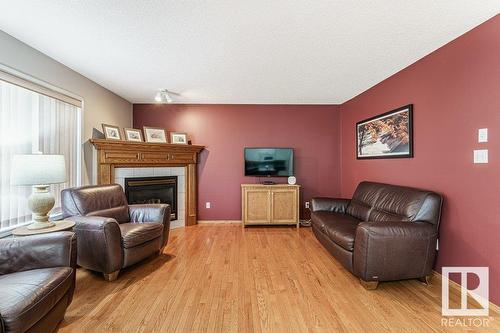 2944 41 Av Nw, Edmonton, AB - Indoor Photo Showing Living Room With Fireplace