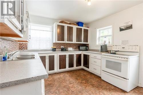 18 Tower Drive, Dieppe, NB - Indoor Photo Showing Kitchen With Double Sink