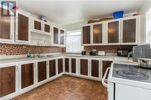 18 Tower Drive, Dieppe, NB - Indoor Photo Showing Kitchen With Double Sink