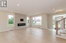 9 Balfour Court, Moncton, NB  - Indoor Photo Showing Living Room With Fireplace 