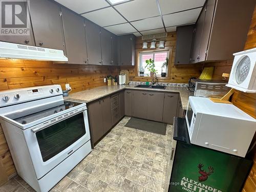 105 Fourth Street, Kirkland Lake, ON - Indoor Photo Showing Kitchen With Double Sink