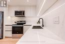 Lower - 90 Eleventh Street, Toronto, ON  - Indoor Photo Showing Kitchen With Double Sink With Upgraded Kitchen 