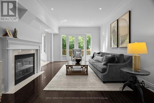 42 True Davidson Drive, Toronto, ON - Indoor Photo Showing Living Room With Fireplace