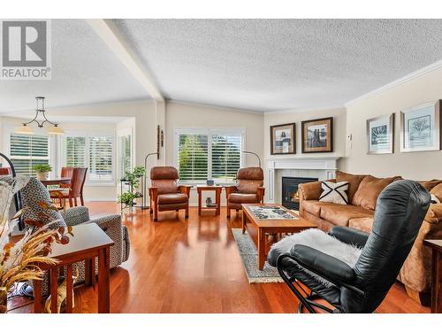 1002 11Th  N Avenue, Creston, BC - Indoor Photo Showing Living Room With Fireplace