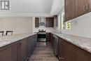 47 Marina Village Drive, Georgian Bay, ON  - Indoor Photo Showing Kitchen With Double Sink 