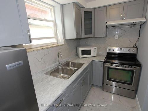 31 Fifteenth St, Toronto, ON - Indoor Photo Showing Kitchen With Double Sink