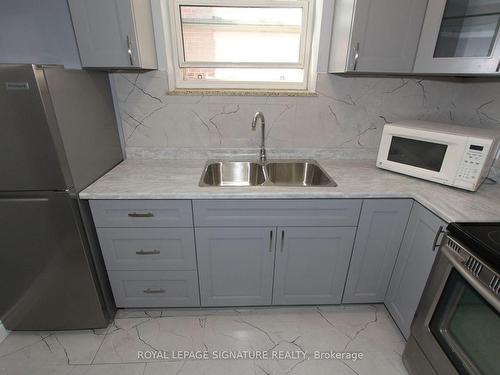 31 Fifteenth St, Toronto, ON - Indoor Photo Showing Kitchen With Double Sink