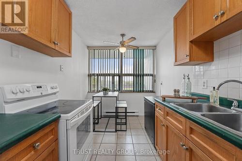 403 - 15 Kensington Road, Brampton, ON - Indoor Photo Showing Kitchen With Double Sink