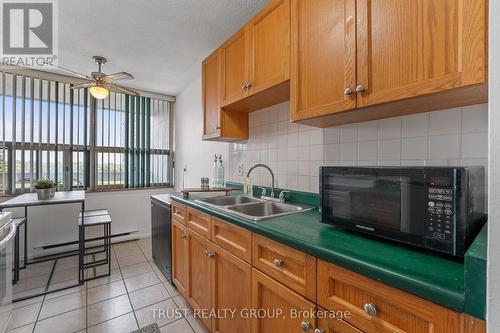 403 - 15 Kensington Road, Brampton, ON - Indoor Photo Showing Kitchen With Double Sink