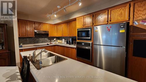 26 Seres Drive, Tillsonburg, ON - Indoor Photo Showing Kitchen With Stainless Steel Kitchen With Double Sink