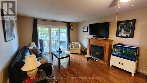 26 Seres Drive, Tillsonburg, ON - Indoor Photo Showing Living Room With Fireplace