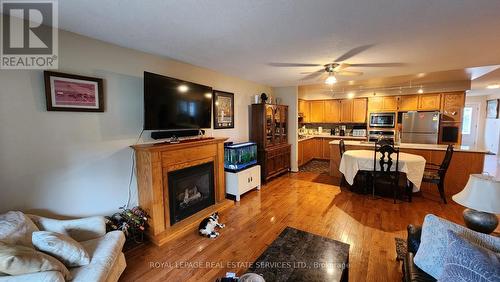 26 Seres Drive, Tillsonburg, ON - Indoor Photo Showing Living Room With Fireplace