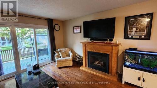 26 Seres Drive, Tillsonburg, ON - Indoor Photo Showing Living Room With Fireplace