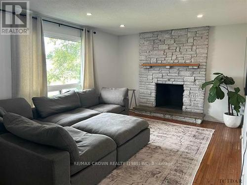 134 Eric Cres Pine, Timmins, ON - Indoor Photo Showing Living Room With Fireplace