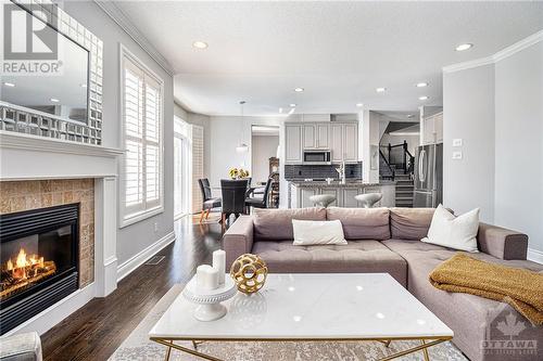 24 Greenpointe Drive, Ottawa, ON - Indoor Photo Showing Living Room With Fireplace