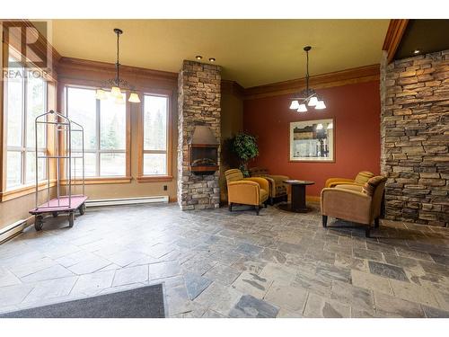 4559 Timberline  Crescent Unit# 611D, Fernie, BC - Indoor With Fireplace