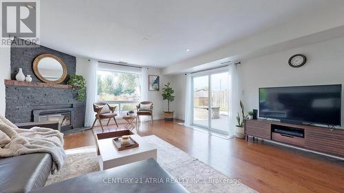 175 Riveredge Drive, Georgina, ON - Indoor Photo Showing Living Room With Fireplace