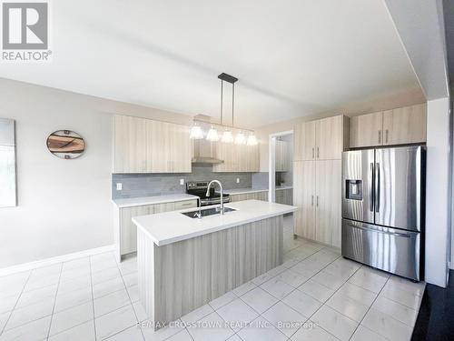 16 Daly Court, Springwater, ON - Indoor Photo Showing Kitchen