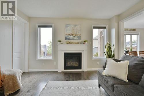 16 Daly Court, Springwater, ON - Indoor Photo Showing Living Room With Fireplace