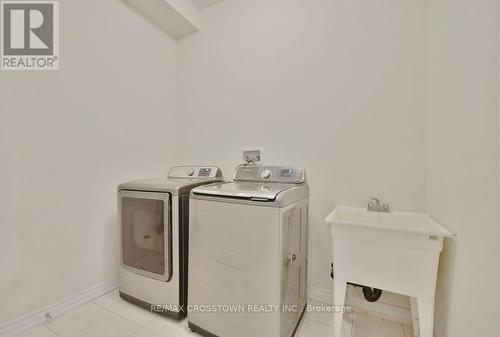 16 Daly Court, Springwater, ON - Indoor Photo Showing Laundry Room