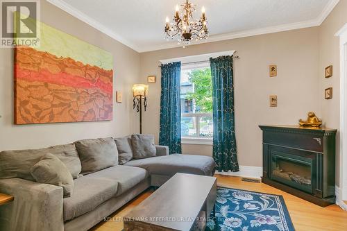 452 Westmoreland Avenue N, Toronto, ON - Indoor Photo Showing Living Room With Fireplace