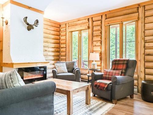 Living room - 27 Ch. De Maple Wood, Harrington, QC - Indoor Photo Showing Living Room With Fireplace