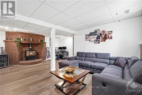 13065 Riverside Drive, South Dundas, ON - Indoor Photo Showing Living Room With Fireplace