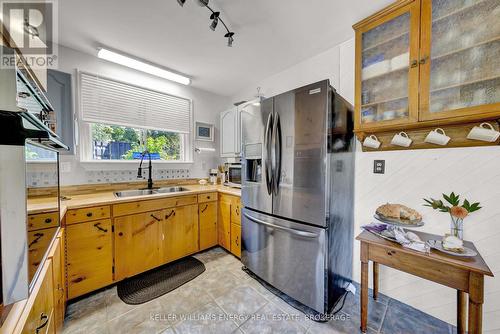 102 Bishop Lane, Prince Edward County (Ameliasburgh), ON - Indoor Photo Showing Kitchen With Double Sink