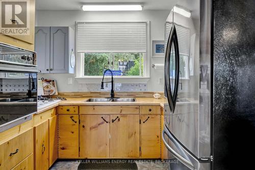 102 Bishop Lane, Prince Edward County (Ameliasburgh), ON - Indoor Photo Showing Kitchen With Double Sink