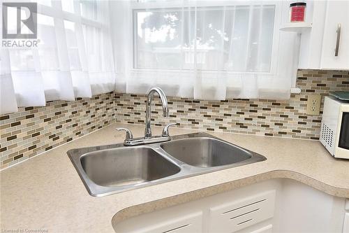 141 S Reid Avenue S, Hamilton, ON - Indoor Photo Showing Kitchen With Double Sink