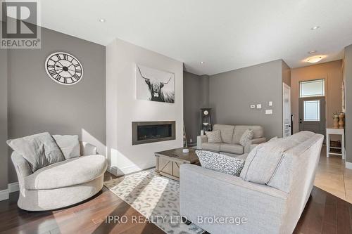 21 Melody Lane, East Luther Grand Valley, ON - Indoor Photo Showing Living Room With Fireplace