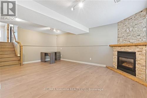 7467 Monastery Drive, Niagara Falls, ON - Indoor With Fireplace