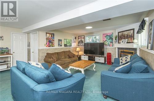 4 College Park Drive, Welland, ON - Indoor Photo Showing Living Room With Fireplace