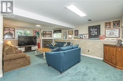 4 College Park Drive, Welland, ON - Indoor With Fireplace