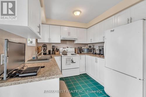 103 Bernice Crescent, Toronto, ON - Indoor Photo Showing Kitchen With Double Sink