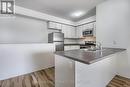 101 - 128 Barrie Street, Bradford West Gwillimbury, ON  - Indoor Photo Showing Kitchen With Double Sink 