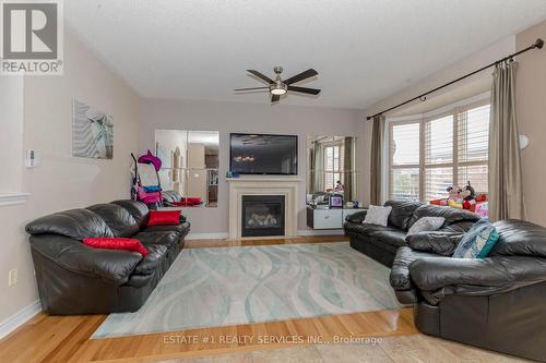 12 Seastar Road, Brampton, ON - Indoor Photo Showing Living Room With Fireplace